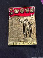 Front view of rectangular Lenin Leningrad pin showing all design details