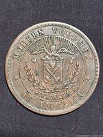 Obverse showing Modern Woodmen of America crest and full inscription