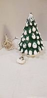 Front view of ceramic Christmas tree with cord visible