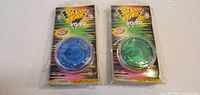 Front view of two sealed Speed Spirit yo-yos showing colours and packaging