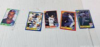 Front view of five baseball cards