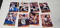 Fronts of 8 glossy MLB trading cards laid out