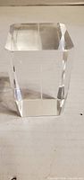 Front view of clear rectangular crystal/glass paperweight