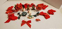 Full lot showing bows, figurines, trees, ornaments