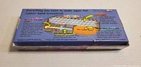 Back of Rainbow Loom kit box with content illustration