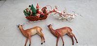 Sleigh with Santa, four white reindeer, two brown reindeer overview
