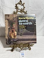 Album front cover on stand