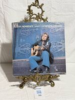 Front album cover showing title and artist