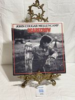 Front cover of Scarecrow LP displayed upright