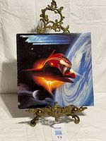 Front cover of ZZ Top Afterburner LP displayed on stand
