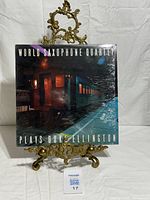 Front cover of LP in shrink on stand