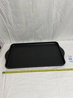 top view showing cooking surface and measuring tape for length