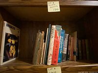 Books on shelf – mix of insect and bird titles