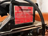 Close-up of Craftsman model plate showing model 315.242210 and branding