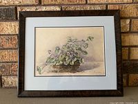 Front view of framed floral watercolour