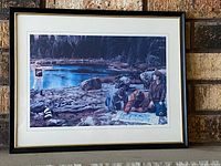 Front view of framed print showing image content, frame and mat