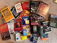 Overhead view of entire assortment of books spread on carpet
