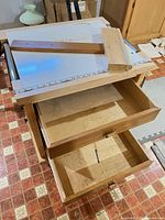 Overall view showing laminated top, drawers and frame