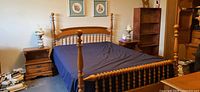 Full view of assembled Roxton queen bed frame with headboard, footboard and side rails