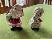 Front view of Santa and Mrs. Claus ceramic shakers