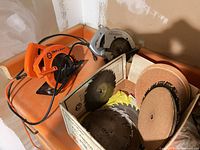 Skilsaw and Black & Decker circular saws on surface