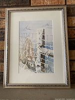Front view of matted and framed winter watercolour
