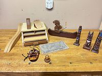Group shot showing all wooden items on bench