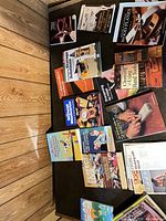 Overall view of books and magazine stack on table