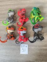 Group of six WowWee Fingerlings Untamed dragons
