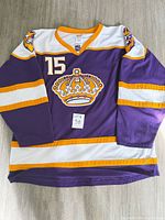 Full view of front of jersey displaying colour, number and stripes