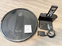 Kyvol E20 robot vacuum, charging dock with remote, power adapter