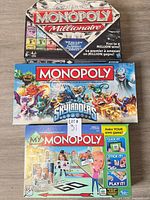 Boxes of Monopoly Millionaire, Monopoly Skylanders, My Monopoly