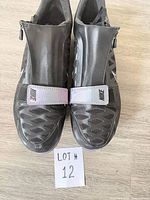 Top view of both shoes showing shroud and strap details