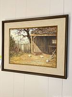 Full view of framed painting on wall showing scene and frame