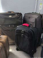 Front view showing all three suitcases together