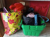 Floral tote, green plastic tote containing additional bags