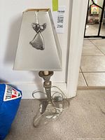 Full view of lamp with ornament attached