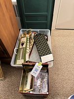 Overview of tote with gift bags and separate smaller box of greeting cards