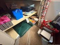 Shelf with gift boxes, bags, paper, bins