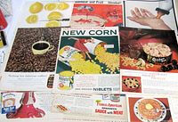 Assorted food ads laid out including coffee beans, Niblets corn, tuna, spaghetti sauce, etc.
