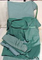 All scrub pieces laid out showing colors and styles