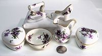 front view of all eight Victorian Violets pieces