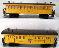 Side view of both cars showing numbers 1865 and 1866 and lettering