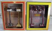 Front view of both boxed lamp sets