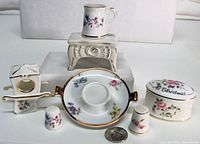 Group view of all seven bone china miniatures