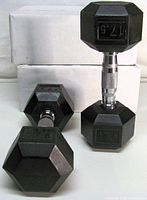 Front view of both dumbbells showing hex heads, weight markings, and chrome handles