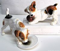 Both Jack Russell figurines front view