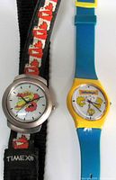 Both wristwatches side by side showing overall appearance