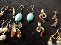 Group shot showing all seven earring pairs