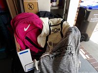 Overview of four bags inside bin